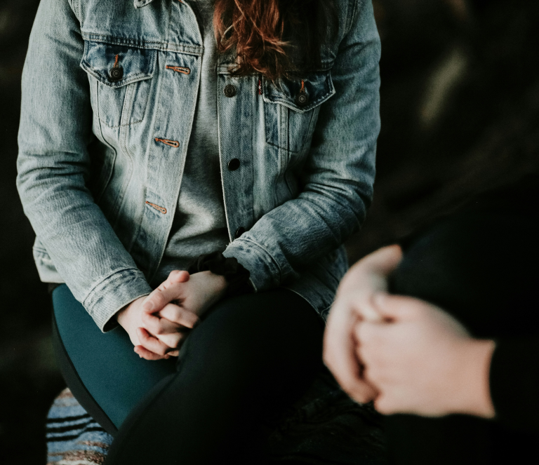 Two people sitting together